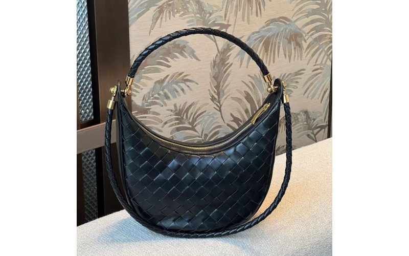 Woven crescent - shaped bag