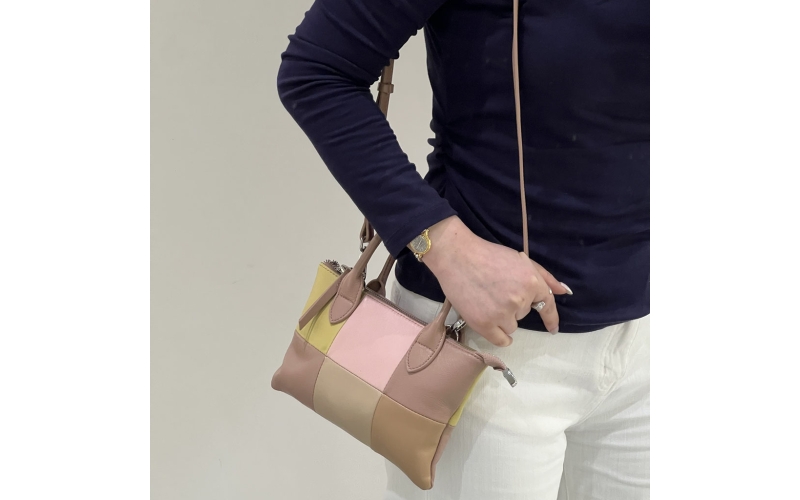 Woven hand - carry and cross - body bag